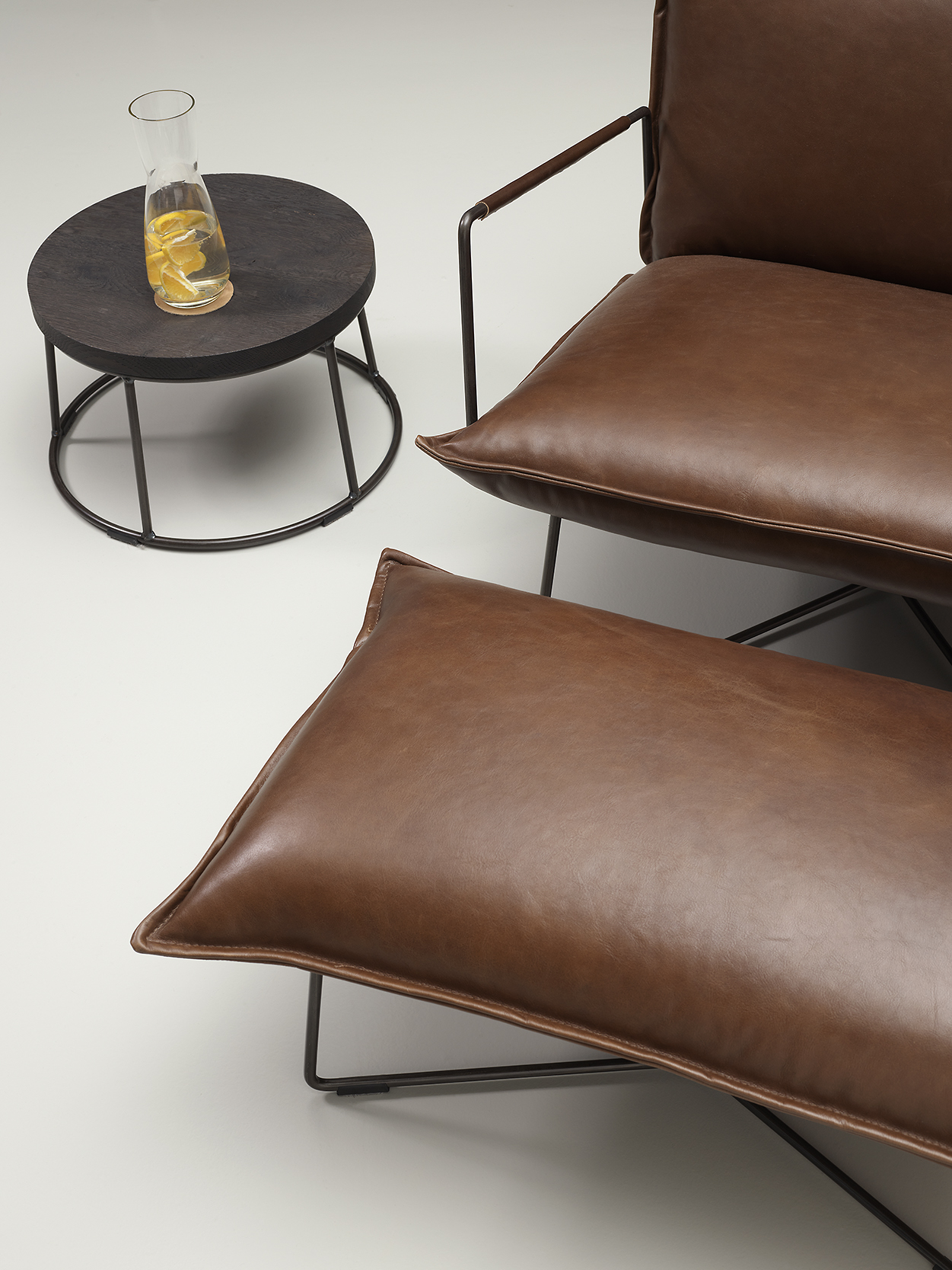 Earl Lounge Chair With Arm & Earl Footstool Luxor Fango Mood1 LR